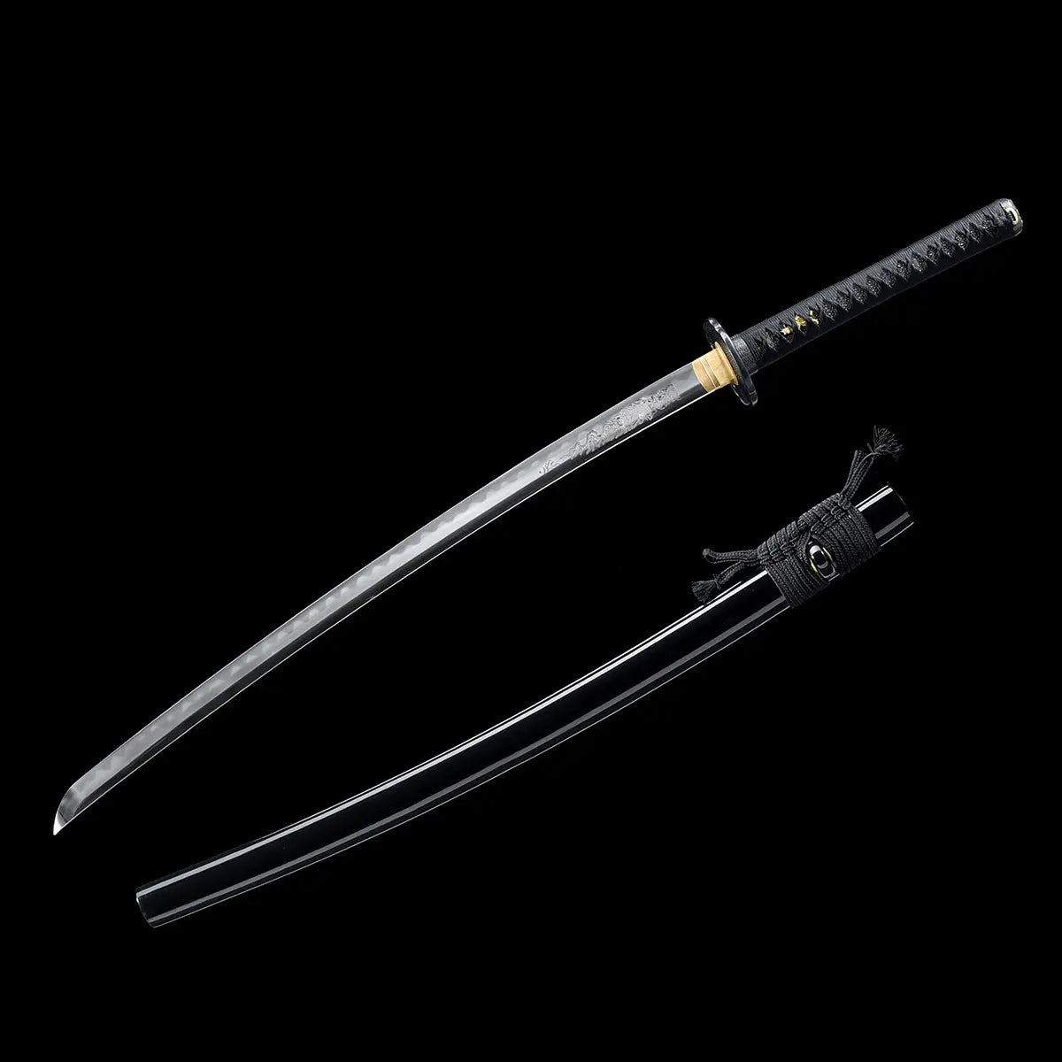 Japanese katana displayed diagonally against a deep black background, polished steel blade fully unsheathed with visible curvature and engraved section near the habaki, black lacquered wooden scabbard placed parallel below, black braided sageo tied around the saya, traditional black handle wrapped with black cord over ray skin, gold-colored habaki and subtle menuki details visible, clean studio composition highlighting blade and scabbard together.
