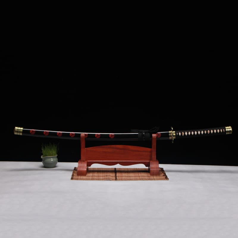 Katana japonais Shusui complet avec fourreau noir décoré de symboles rouges, lame forgée main.