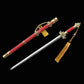 Épée chinoise Jian LONGQUAN HONG LONG entièrement sortie de son fourreau rouge texturé, avec lame droite en acier plié, garde dorée ouvragée, poignée rouge, dragonne jaune à pompon et fond noir.