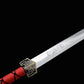 Épée chinoise Jian TIAN LONG avec lame droite en acier gravée d’un dragon et d’un motif céleste, garde métallique décorée, poignée rouge entourée d’un cordage noir et prise de vue rapprochée sur fond noir.