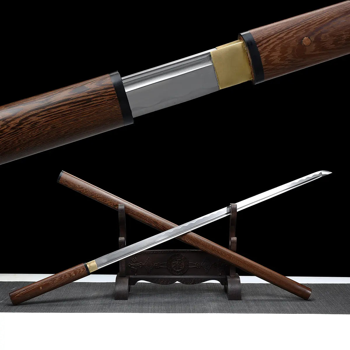 Wooden sword cane displayed on a black background, with the blade partially unsheathed from its dark brown wooden scabbard. The cane features a smooth wooden handle and scabbard with visible wood grain, a brass collar at the junction, and a straight polished steel blade with a central fuller. The sword cane is resting diagonally on a dark wooden display stand placed on a grey fabric surface, showing both the sheathed cane and the exposed blade.  
