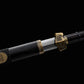 Épée chinoise Jian ZHEN ZHAI partiellement sortie de son fourreau noir en ébène, avec lame droite en acier plié, garde bronze ancien gravée, plaque décorative Zhen Zhai et finition sombre sur fond noir.